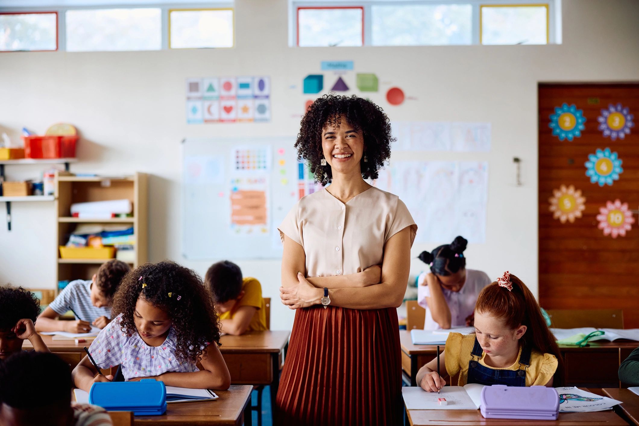 school teacher teaching students